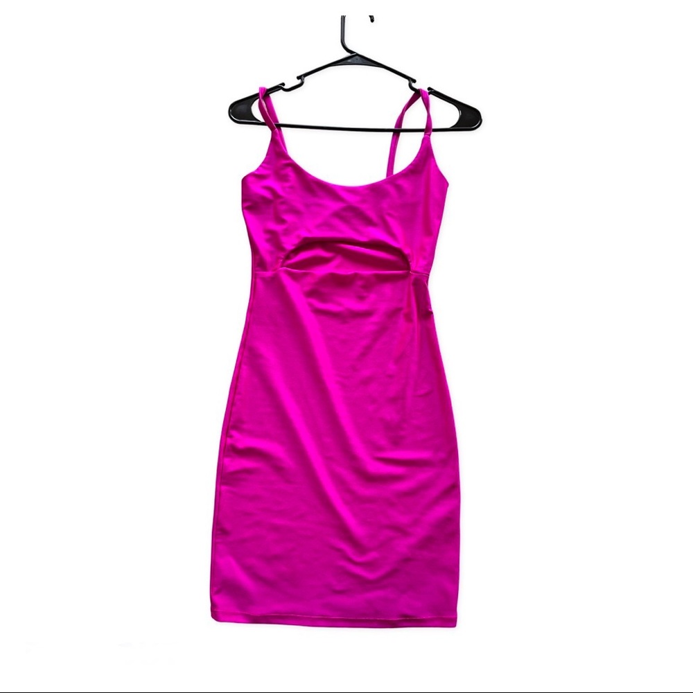 Bright pink bodycon dress with cut out in the middle